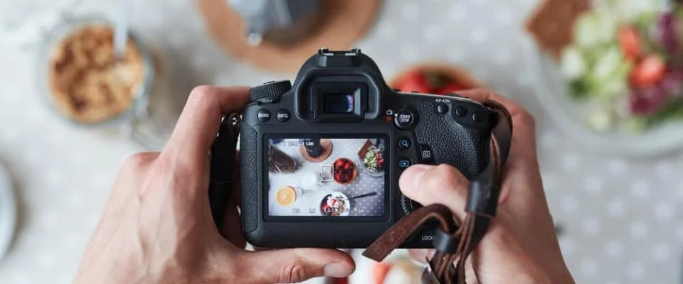 Professional food-photographer making shot of food for advert