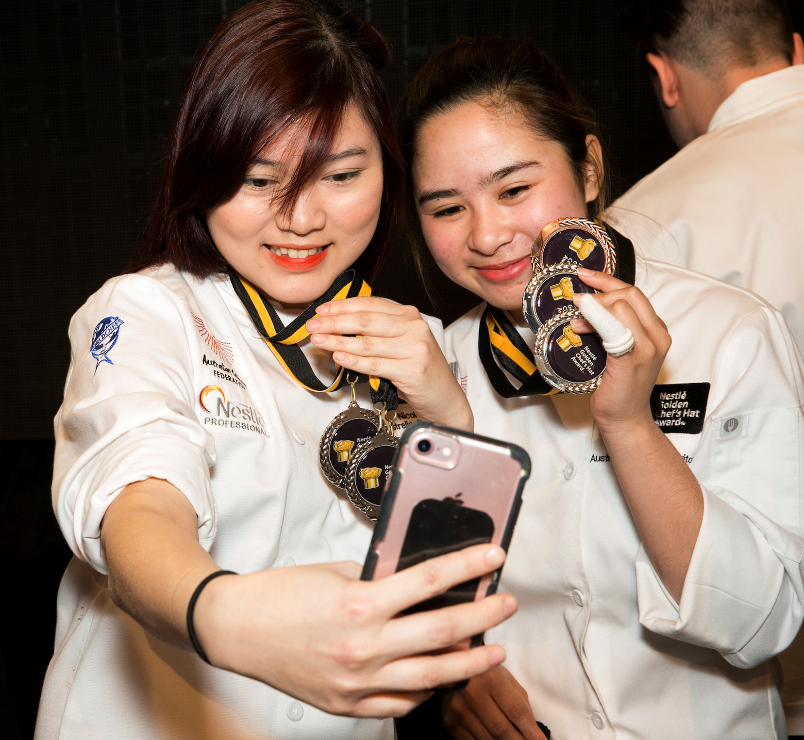 Awarded candidates taking selfies
