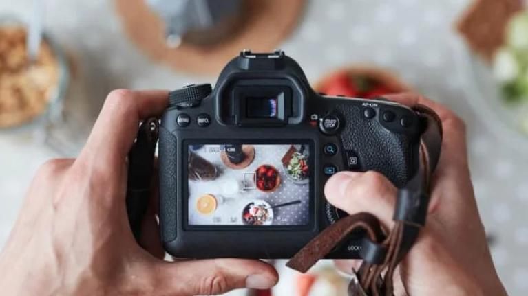 Professional food-photographer making shot of food for advert